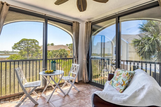2229 Vista Cove Rd, Saint Augustine, FL 32084 - sunroom / solarium featuring ceiling fan and tile patterned floors