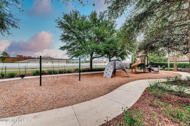 community play area featuring fence