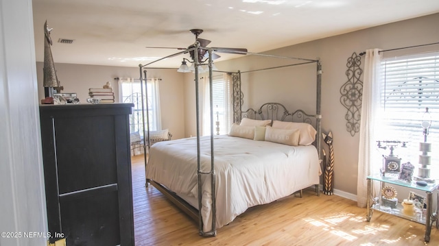 4565 SE 3rd Pl, Keystone Heights, FL 32656 - bedroom featuring visible vents, light wood-type flooring, and baseboards
