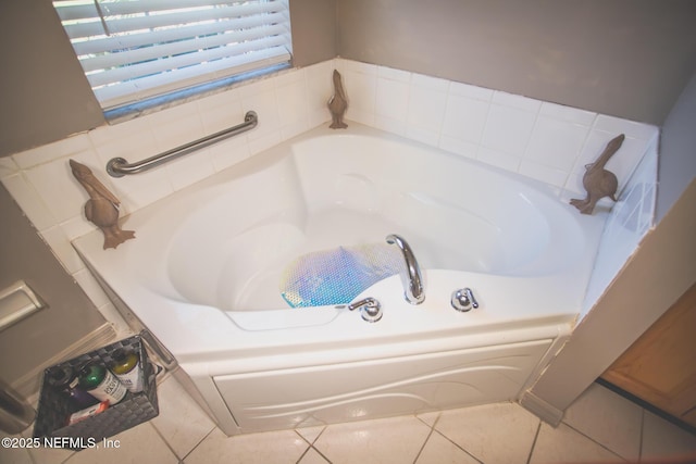 4565 SE 3rd Pl, Keystone Heights, FL 32656 - bathroom with tile patterned flooring and a garden tub