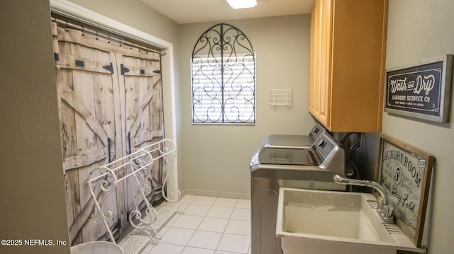 4565 SE 3rd Pl, Keystone Heights, FL 32656 - clothes washing area with tile patterned floors, independent washer and dryer, a sink, and cabinet space