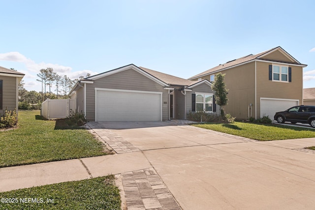 2916 Duck Hollow Ln, Green Cove Springs, FL 32043 - view of front of home with driveway, a front yard, and a garage