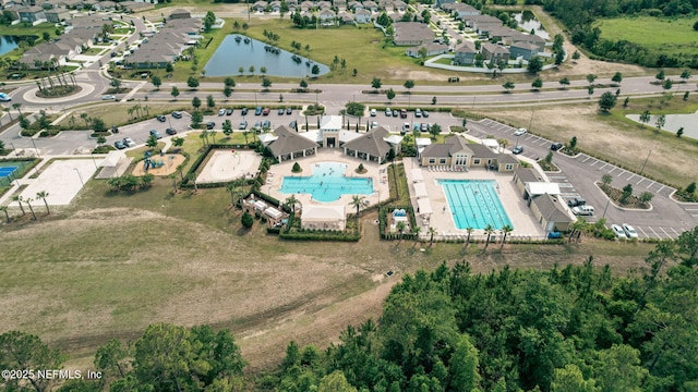 2916 Duck Hollow Ln, Green Cove Springs, FL 32043 - aerial view of property and surrounding area featuring a pool, a large body of water, and nearby suburban area