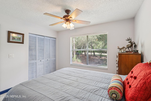 6470 Brooklyn Bay Rd, Keystone Heights, FL 32656 - bedroom with a closet, a textured ceiling, and ceiling fan