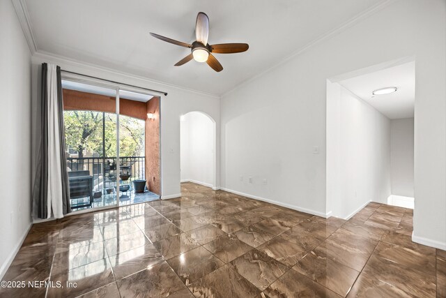 10075 Gate Pkwy N Unit 2505, Jacksonville, FL 32246 - unfurnished room with a ceiling fan, baseboards, arched walkways, and crown molding