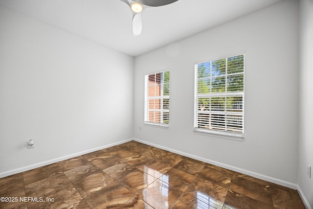10075 Gate Pkwy N Unit 2505, Jacksonville, FL 32246 - spare room with baseboards and a ceiling fan