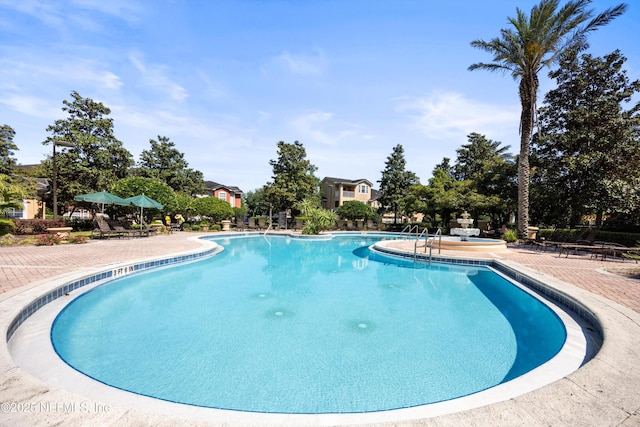 10075 Gate Pkwy N Unit 2505, Jacksonville, FL 32246 - community pool with a patio