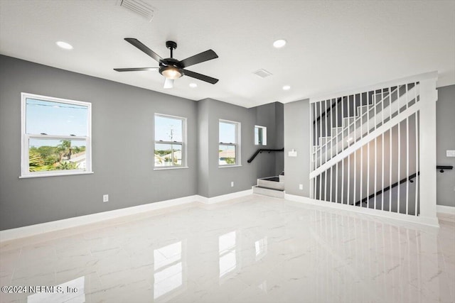 interior space with visible vents, marble finish floor, baseboards, stairway, and recessed lighting