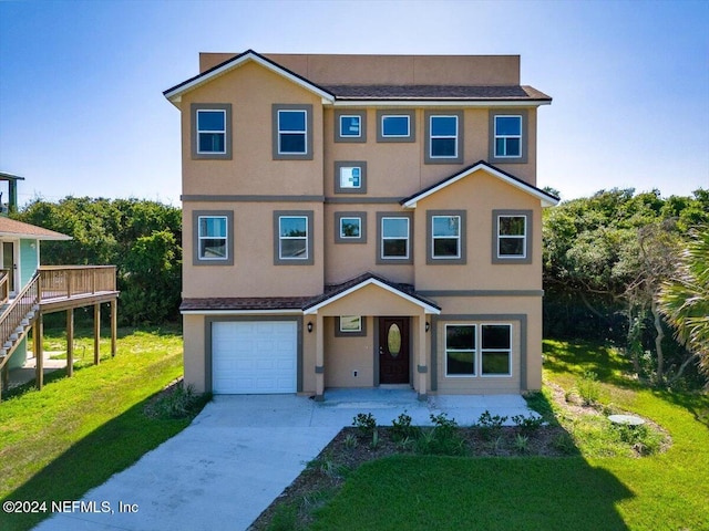 view of front of house featuring driveway, a front yard, a garage, stairs, and stucco siding
