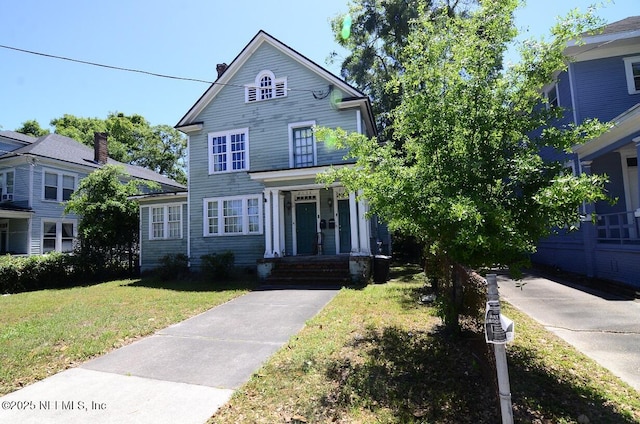 2138 Park St, Jacksonville, FL 32204 - traditional-style house with a front yard