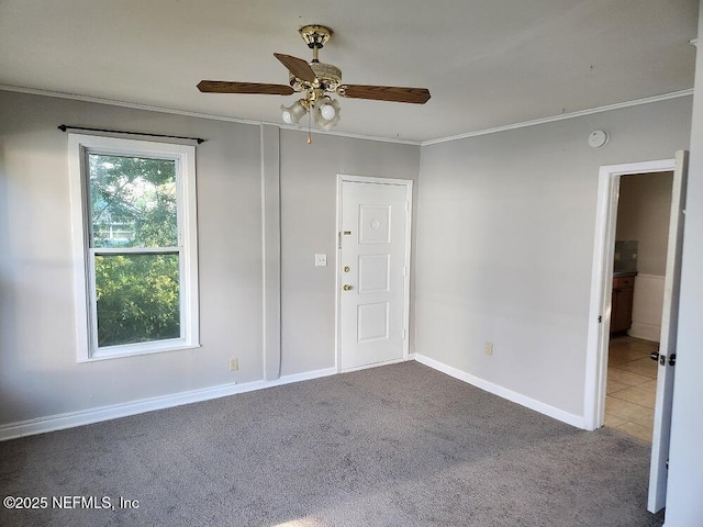 2138 Park St, Jacksonville, FL 32204 - carpeted foyer entrance featuring a ceiling fan, baseboards, and ornamental molding