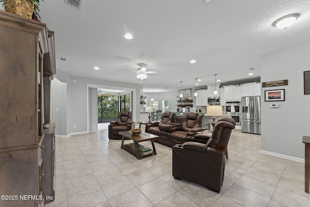 3422 Oglebay Dr, Green Cove Springs, FL 32043 - living area featuring recessed lighting, baseboards, a ceiling fan, and light tile patterned floors