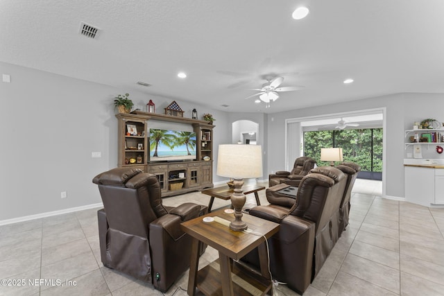 3422 Oglebay Dr, Green Cove Springs, FL 32043 - living area with light tile patterned floors, arched walkways, a ceiling fan, visible vents, and recessed lighting