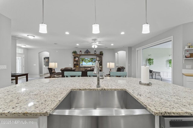 3422 Oglebay Dr, Green Cove Springs, FL 32043 - kitchen featuring arched walkways, open floor plan, and a sink