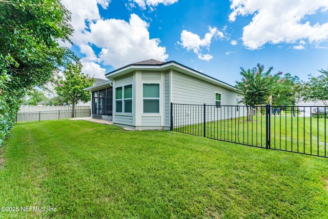 3422 Oglebay Dr, Green Cove Springs, FL 32043 - view of side of home with a yard and a fenced backyard