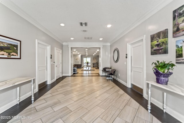3422 Oglebay Dr, Green Cove Springs, FL 32043 - entrance foyer featuring crown molding, baseboards, visible vents, and recessed lighting