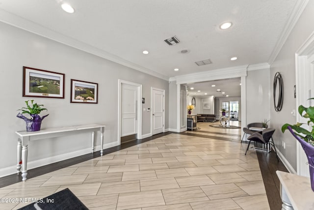 3422 Oglebay Dr, Green Cove Springs, FL 32043 - foyer with crown molding, visible vents, baseboards, and recessed lighting