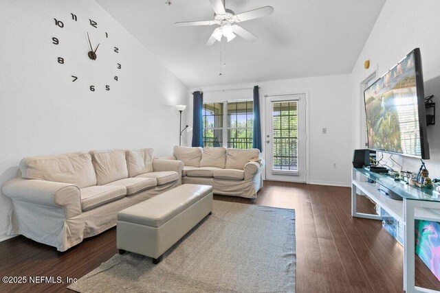 7800 Point Meadows Dr Unit 1035, Jacksonville, FL 32256 - living room featuring lofted ceiling, wood finished floors, a ceiling fan, and baseboards