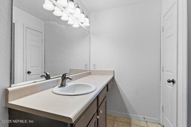 7800 Point Meadows Dr Unit 1035, Jacksonville, FL 32256 - bathroom with vanity and baseboards