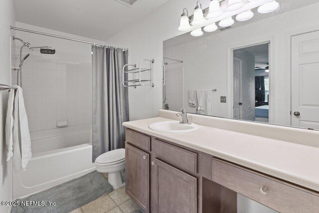 7800 Point Meadows Dr Unit 1035, Jacksonville, FL 32256 - bathroom featuring shower / tub combo, toilet, vanity, and tile patterned floors