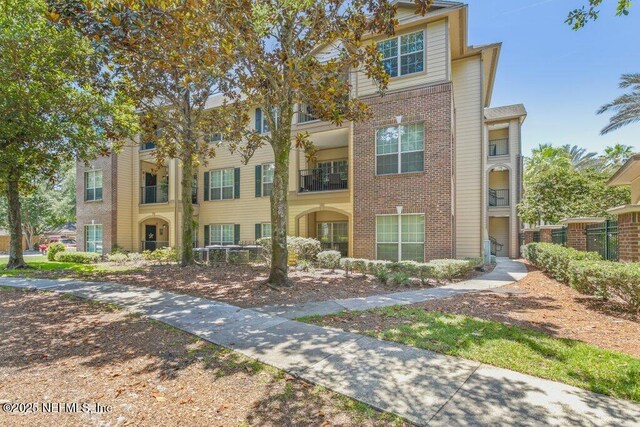 7800 Point Meadows Dr Unit 1035, Jacksonville, FL 32256 - view of front of house with brick siding