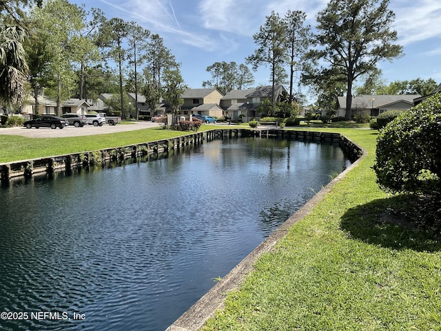 view of water feature with a residential view
