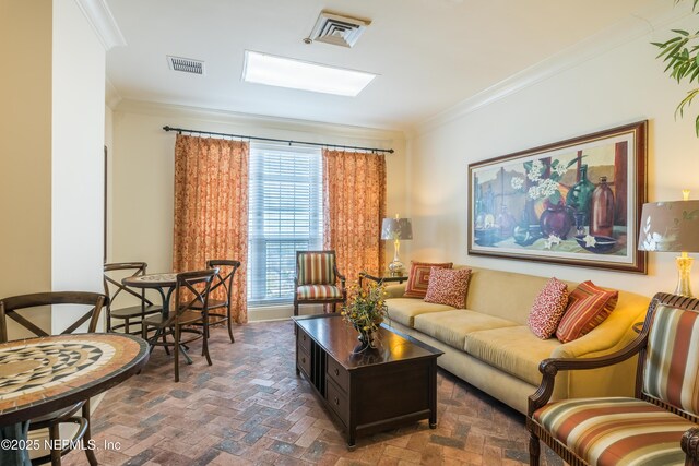 400 E Bay St Unit 502, Jacksonville, FL 32202 - living room with brick floor, visible vents, and ornamental molding