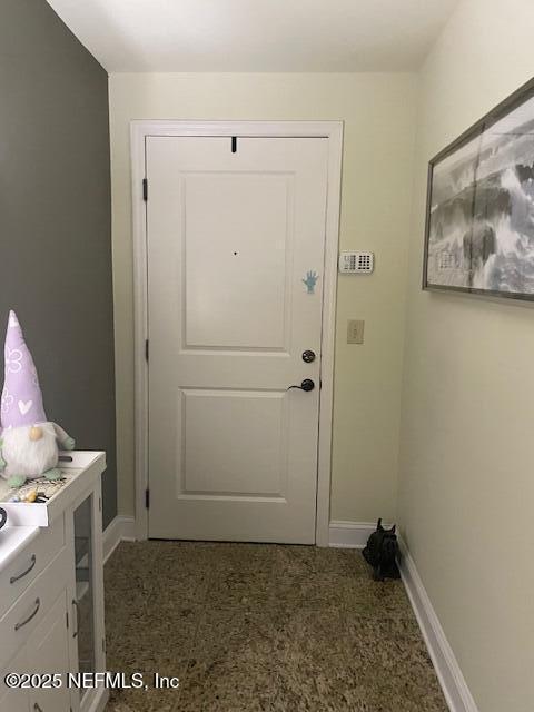 400 E Bay St Unit 502, Jacksonville, FL 32202 - entryway featuring baseboards and carpet floors