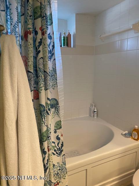 400 E Bay St Unit 502, Jacksonville, FL 32202 - full bath featuring shower / bathtub combination with curtain