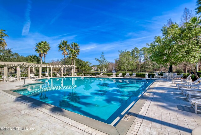 7701 Timberlin Park Blvd Unit 531, Jacksonville, FL 32256 - community pool with a pergola and a patio