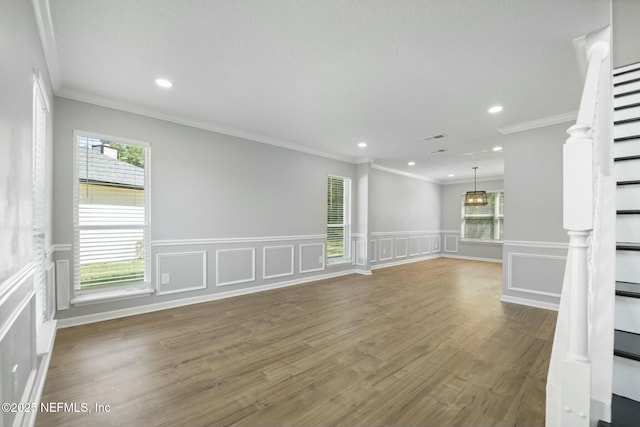 3399 Shauna Oaks Cir, Jacksonville, FL 32277 - unfurnished living room with recessed lighting, a healthy amount of sunlight, and wainscoting