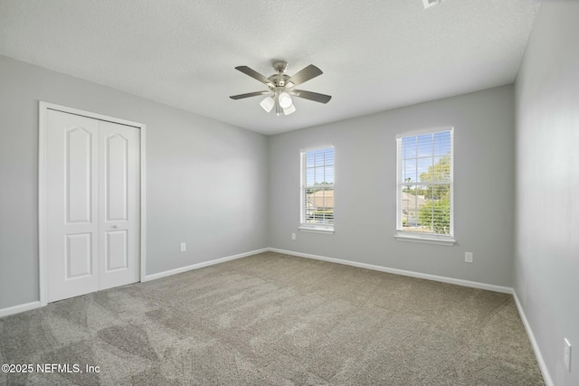 3399 Shauna Oaks Cir, Jacksonville, FL 32277 - unfurnished bedroom with carpet floors, a closet, and baseboards