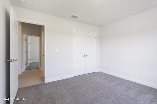 3211 Winding Creek Pl, Green Cove Springs, FL 32043 - unfurnished bedroom featuring visible vents, baseboards, a closet, and carpet