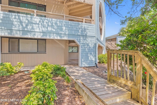 doorway to property featuring a balcony