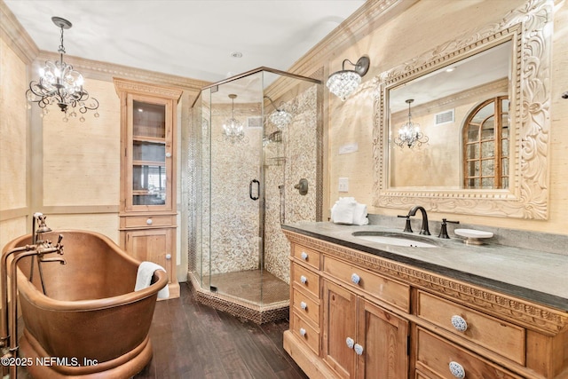 bathroom featuring visible vents, a stall shower, and a chandelier