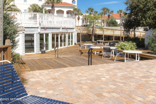 wooden deck with outdoor dining area