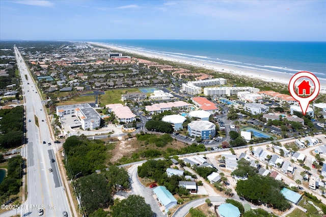 aerial view featuring a beach view and a water view