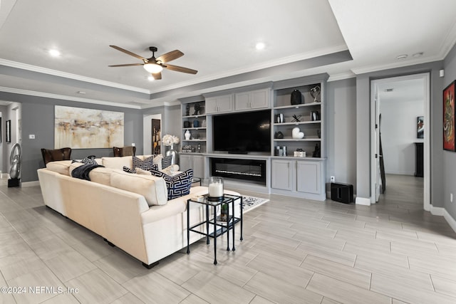 living area with recessed lighting, wood tiled floor, a ceiling fan, crown molding, and baseboards