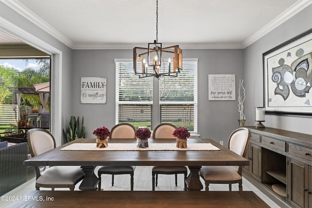dining space with a notable chandelier and ornamental molding