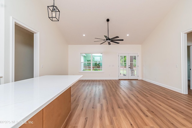6388 Miltondale Rd, Macclenny, FL 32063 - unfurnished living room with recessed lighting, vaulted ceiling, light wood-type flooring, baseboards, and ceiling fan