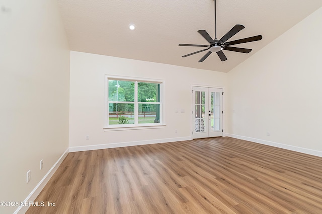 6388 Miltondale Rd, Macclenny, FL 32063 - unfurnished room with french doors, vaulted ceiling, baseboards, light wood-style floors, and ceiling fan