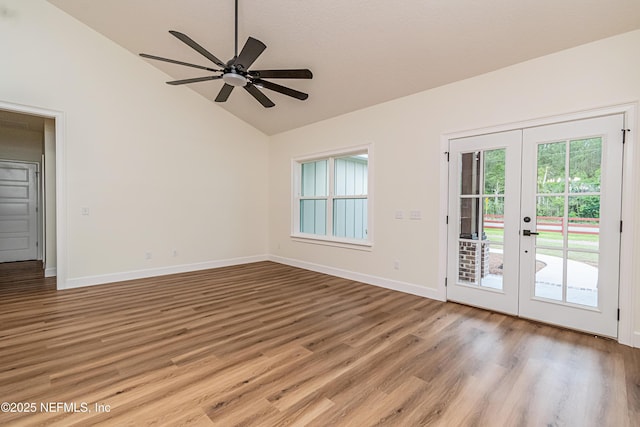 6388 Miltondale Rd, Macclenny, FL 32063 - interior space with high vaulted ceiling, ceiling fan, french doors, light wood-style flooring, and baseboards
