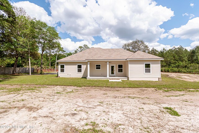 6388 Miltondale Rd, Macclenny, FL 32063 - back of house with fence, a lawn, and a patio