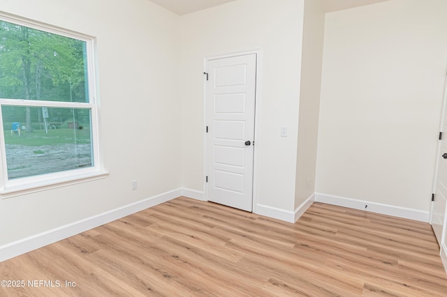 6388 Miltondale Rd, Macclenny, FL 32063 - unfurnished room with baseboards and light wood-style flooring