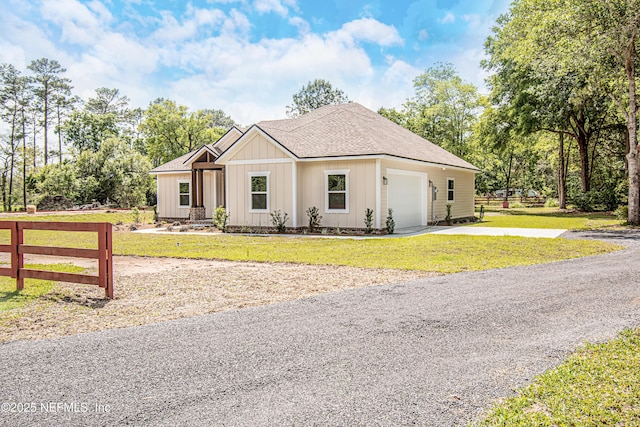 6388 Miltondale Rd, Macclenny, FL 32063 - single story home with a garage, a shingled roof, concrete driveway, and fence