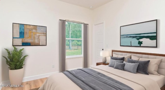 6388 Miltondale Rd, Macclenny, FL 32063 - bedroom featuring baseboards and wood finished floors