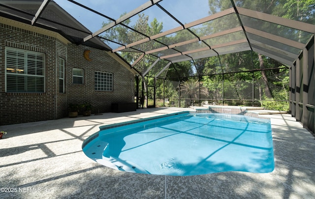pool featuring a patio area and a lanai