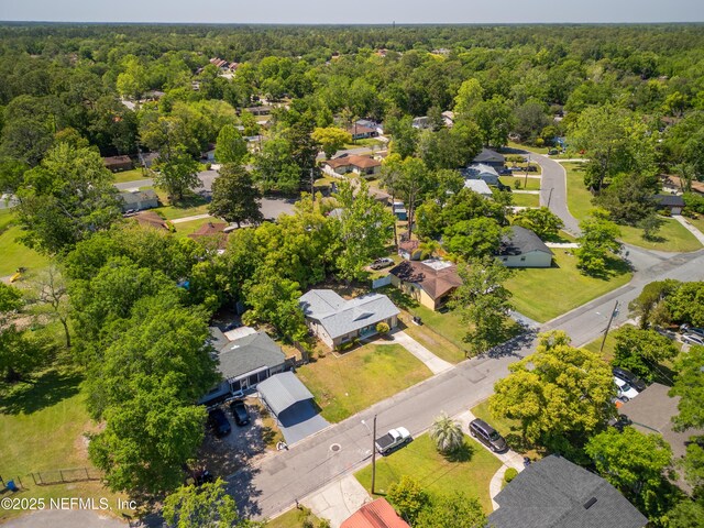 4532 Jade Dr E, Jacksonville, FL 32210 - bird's eye view with a residential view and a wooded view