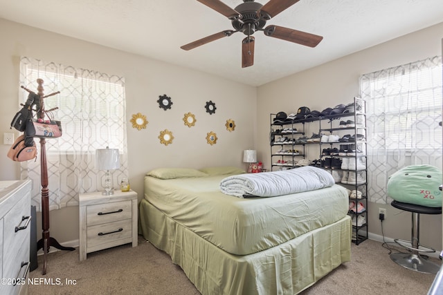 4532 Jade Dr E, Jacksonville, FL 32210 - bedroom with ceiling fan and light carpet