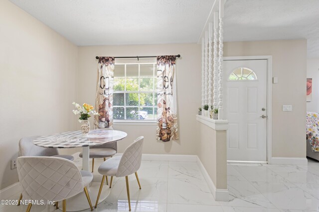 4532 Jade Dr E, Jacksonville, FL 32210 - dining space with marble finish floor and baseboards